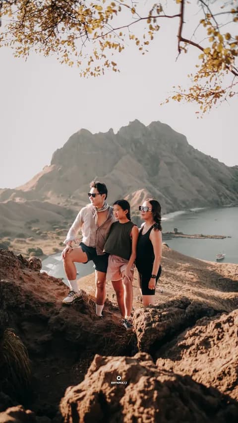 Family trekking the Padar Island viewpoint trail